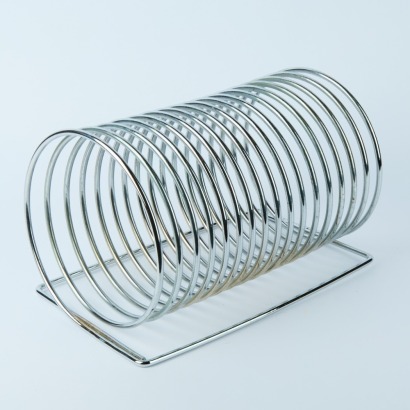 A Chrome Spiralised Magazine Rack