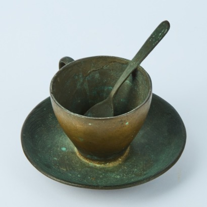A Cast Bronze Cup, Saucer and Spoon