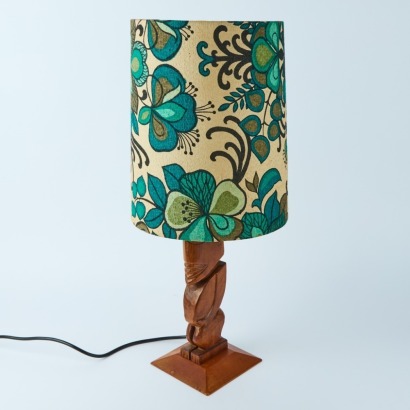 A Vintage Carved Decorative Tiki Lamp with Period Floral and Fauna Shade