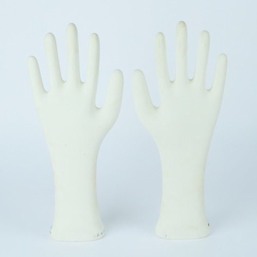 A Pair of Porcelain Glove Moulds