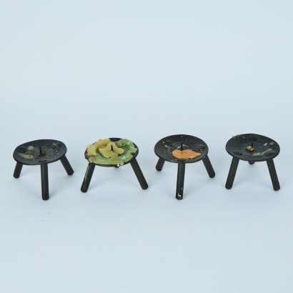 A Collection of Four Candlestick Holders