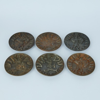 A Set of Six Antique Henri Maire Vin Fou Cast Iron Ashtrays