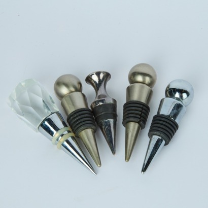 A Set of Five Wine Bottle Stoppers