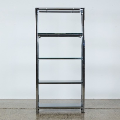A Chrome and Glass Shelving Unit