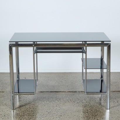 A Chrome and Smokey Black Glass Desk