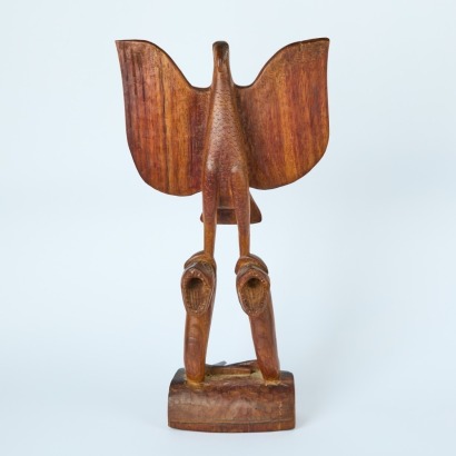 A PNG Carving of an Eagle on Serpents