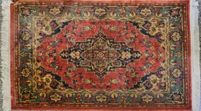 A Hand-Knotted Persian Rug