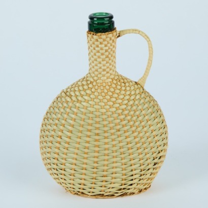 A Woven Cased Rum Bottle