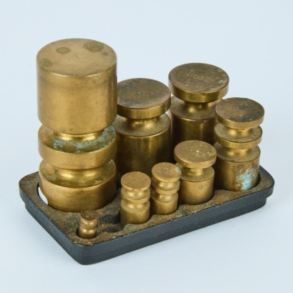 A Set of Eight Brass Weights