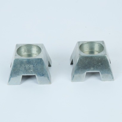 A Pair of Aluminium Candle Holders