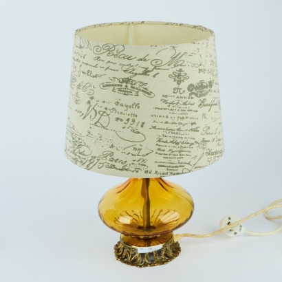 An Amber Art Glass Lamp with Brass Footing
