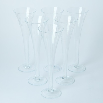 A Set of Six Etched Hollow-Stemmed Champagne Flutes
