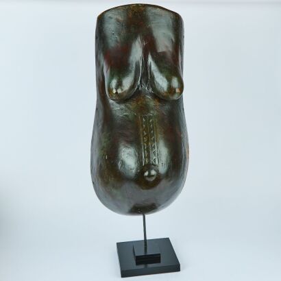 A Large Carved Pregnant African Bust on a Stand