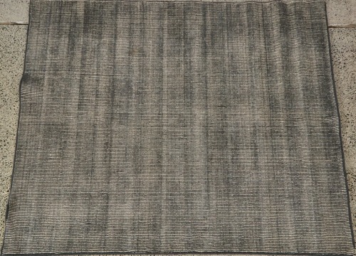 A Striped Wool Nodi Rug