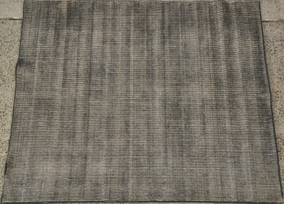 A Striped Wool Nodi Rug