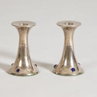 A Pair of Arts and Crafts Candleholders