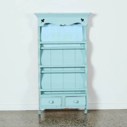A Three Tiered Turquoise Mobile Storage Unit
