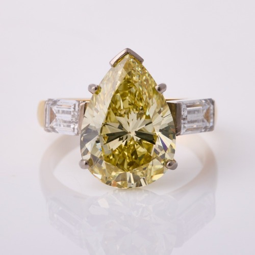 18ct Yellow / White Gold, 5.00ct Fancy Yellow Pear Shape Diamond / .89ct Baguette Cut Diamond Ring