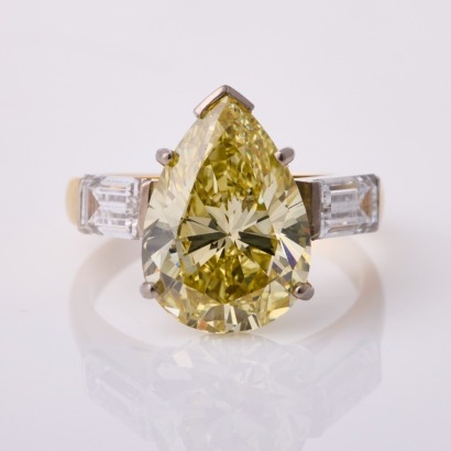 18ct Yellow / White Gold, 5.00ct Fancy Yellow Pear Shape Diamond / .89ct Baguette Cut Diamond Ring