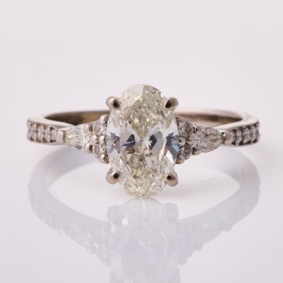 18ct White Gold, 1.70ct Oval Brilliant Cut / .40ct Diamond Ring