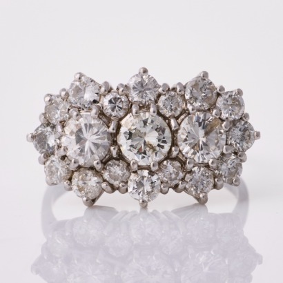 18ct White Gold, .98ct Three Stone Round Brilliant Cut / 1.12ct Diamond Cluster Ring