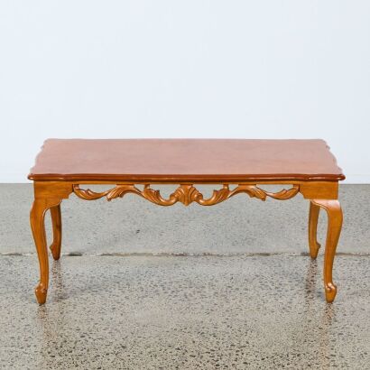 A Walnut Coffee Table