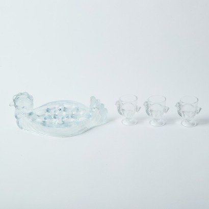A French Glass Chicken Egg Holder and Three Egg Cups
