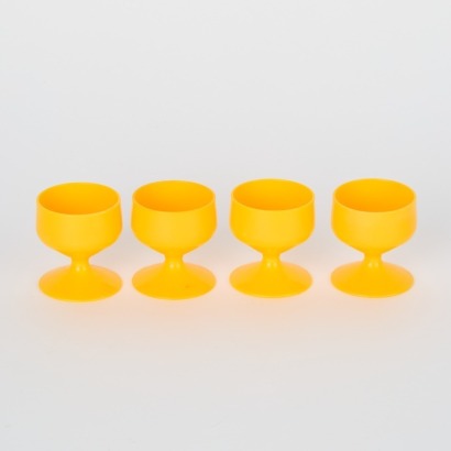 A Set of Four Yellow Egg Cups