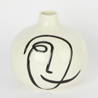 An Abstract Faced Ceramic Vase