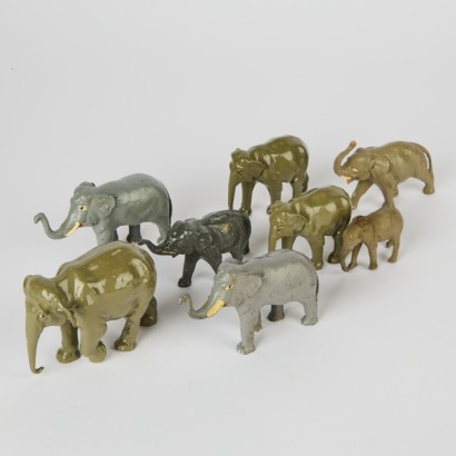 A Collection of Eight Vintage Toy Elephants