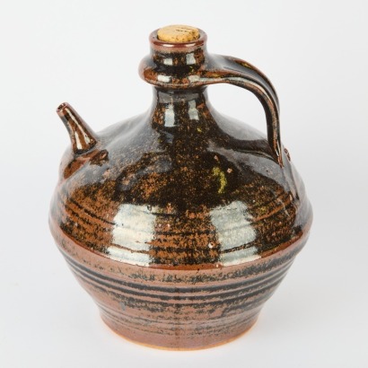A Large Andrew Van der Putten Flagon with Sout and Strap Handle