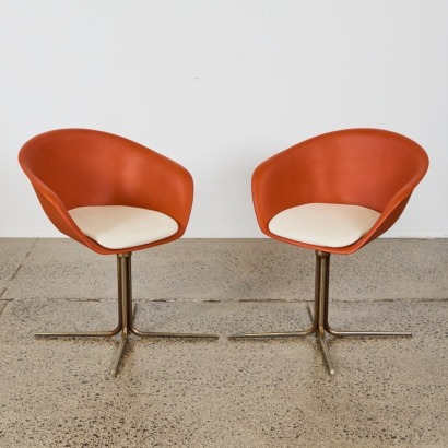 A Pair of Arper Swivel Armchairs