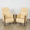 A Pair of High Back Lounge Chairs in the Style of Giorgetti