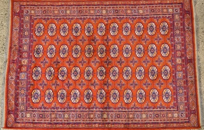 A Hand-Knotted Woollen Rug