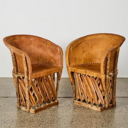 A Pair of Mexican Equipale Chairs