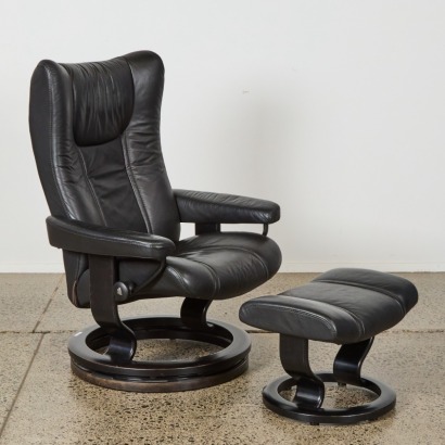 An Ekornes Stressless Leather Recliner and Ottoman