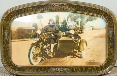 A Heirloom Print of a Woman Driving a Motorcycle with Side Car