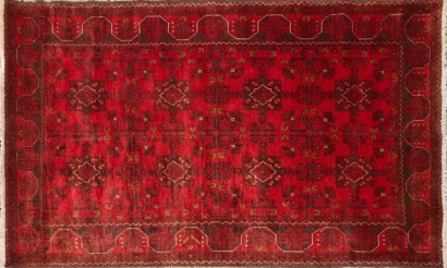 An Afghan Hand-Knotted Rug