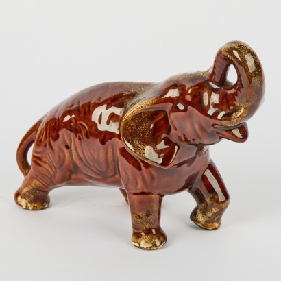 An Aquila Elephant in a Rockingham Style Glaze