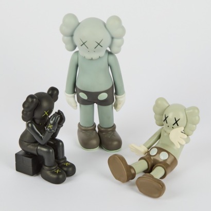 A Set of Three Replica Kaws Toys
