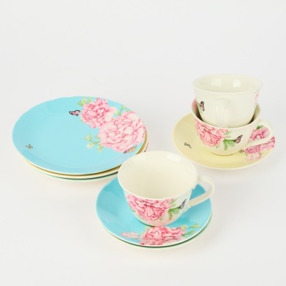 A Set of Three Miranda Kerr Royal Albert Teacups, Saucers and Bread and Butter Plates