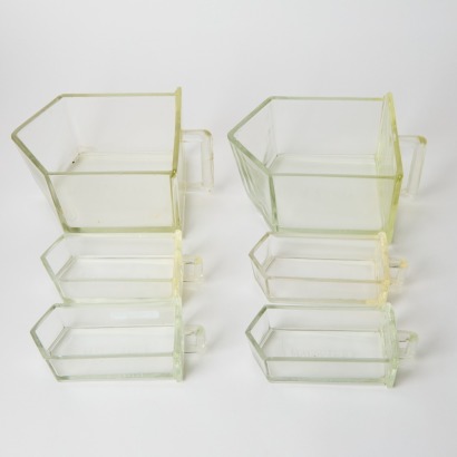 A Set of Vintage Kitchen Glass Chutes