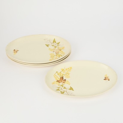 A Set of Four Oval Crown Lynn Autumn Splendour Dinner Plates