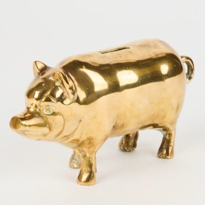 A Vintage Brass Piggy Bank