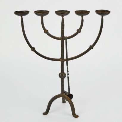 A Wrought Iron Candelabra and Snuffer