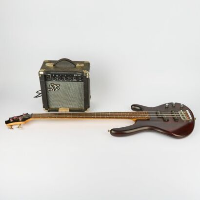 A Cort Four String Electric Bass with Amp, Lead and Case