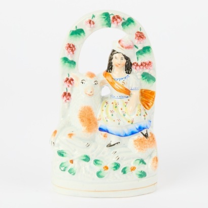 A Staffordshire Figurine of a Girl on Sheep
