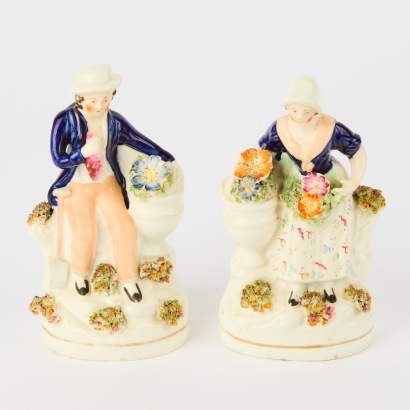 A Pair of Staffordshire Figurines of a Lady and Lad