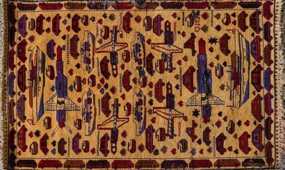 An Afghani War Rug with Fighter Plane and Car Motif
