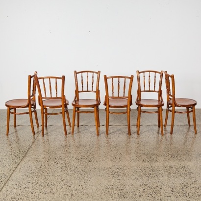 A Set of Six Bistro Chairs
